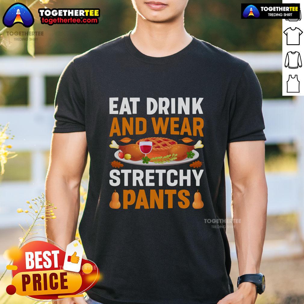 Funny Eat Drink And Wear Stretchy Pants Thanksgiving T-Shirt featuring a humorous design perfect for holiday feasting.