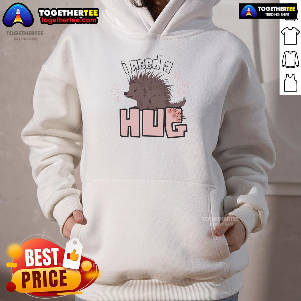 Funny porcupine graphic on a cozy hoodie, captioned 'I Need A Hug,' perfect for casual wear and animal lovers.
