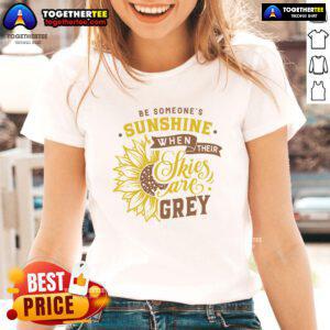 Nice Be Someone's Sunshine When Their Skies Are Grey Ladies Tee featuring a cheerful sun graphic on a stylish shirt.