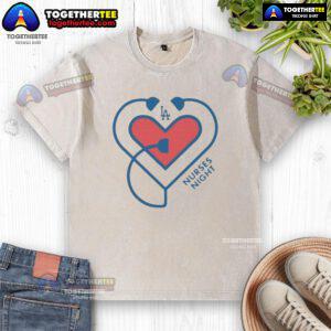 Heart graphic on a washed t-shirt for Nurses Night, featuring Los Angeles Dodgers logo, perfect for fans and healthcare workers.