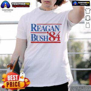 Nice Reagan Bush '84 T-Shirt featuring vintage political campaign design and iconic colors, perfect for collectors.