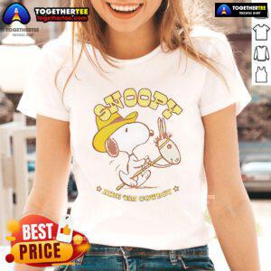 Retro ladies tee featuring Snoopy riding a cowboy, perfect for casual wear and Snoopy fans. Nice Snoopy Ride Em Cowboy design.