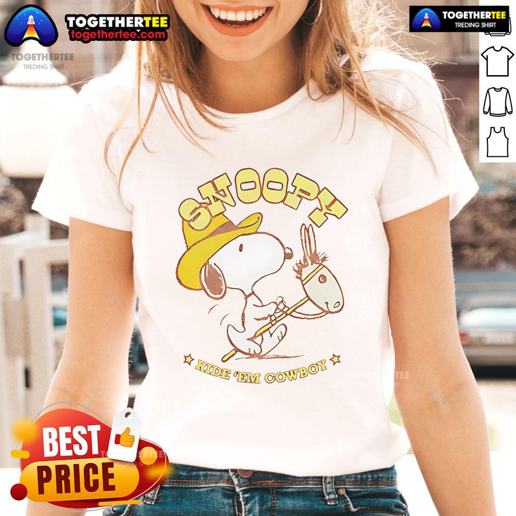 Retro ladies tee featuring Snoopy riding a cowboy, perfect for casual wear and Snoopy fans. Nice Snoopy Ride Em Cowboy design.