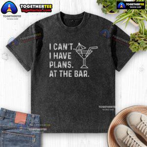 Alt Text: Official I Can't I Have Plans At The Bar washed t-shirt design featuring fun text and casual style.