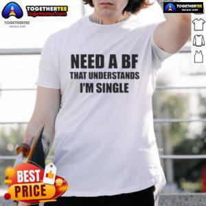 Alt Text: Official I Need A Boyfriend That Understands I'm Single T-Shirt design featuring bold text on a stylish tee.