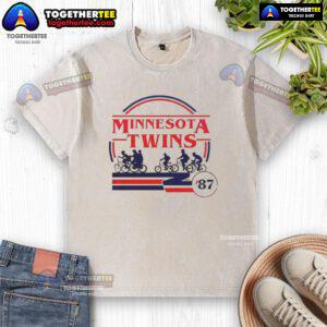 Official Minnesota Twins Stranger Things washed t-shirt featuring a vintage design and vibrant team colors.