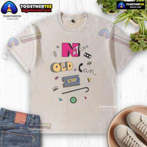 Official Nothing Old Can Stay Washed T-Shirt displayed on a wooden background, showcasing its unique design and fabric.