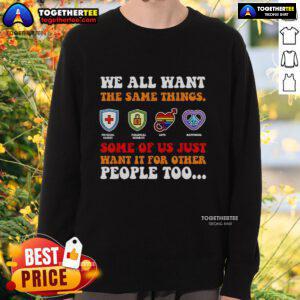 Alt Text: Cozy 'We All Want The Same Things' sweatshirt featuring a motivational quote, perfect for spreading positivity.