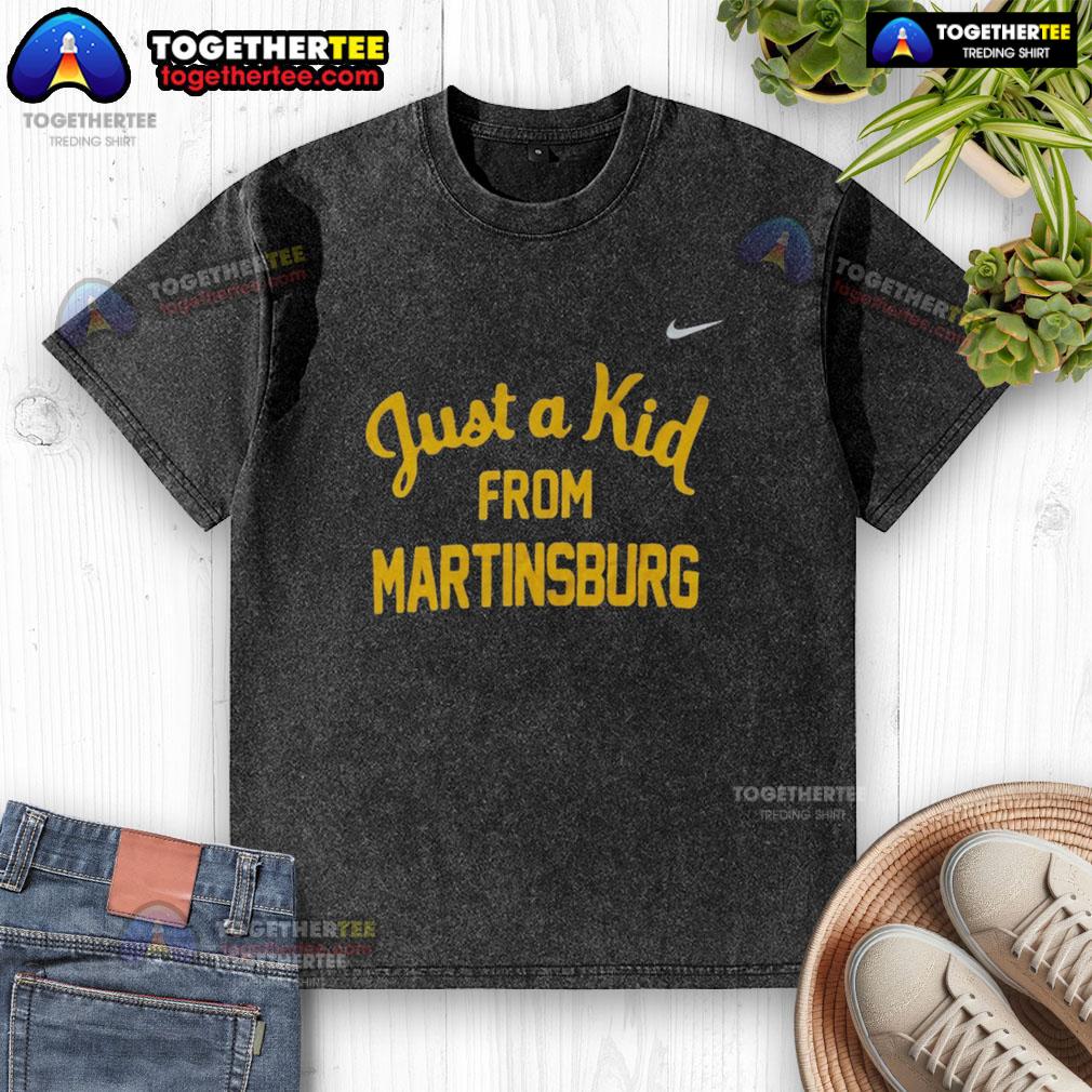 Official West Virginia Mountaineers 'Just A Kid From Martinsburg' washed t-shirt showcasing team pride and local spirit.