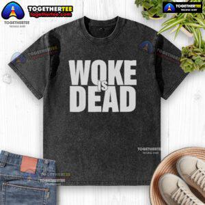 Alt Text: Official Woke Is Dead Washed T-Shirt featuring a bold slogan on a vintage-style fabric, perfect for casual wear.