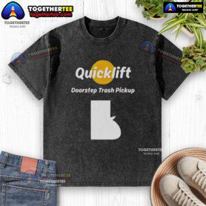 Alt Text: Original Quicklift Doorstep Trash Pickup logo on a washed T-shirt, promoting eco-friendly waste management services.