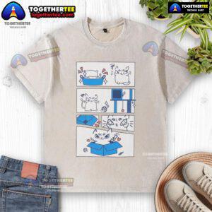 Alt Text: Cute cat sitting in a box wearing the 'Ure Cute' washed T-shirt, showcasing its playful personality and love for boxes.