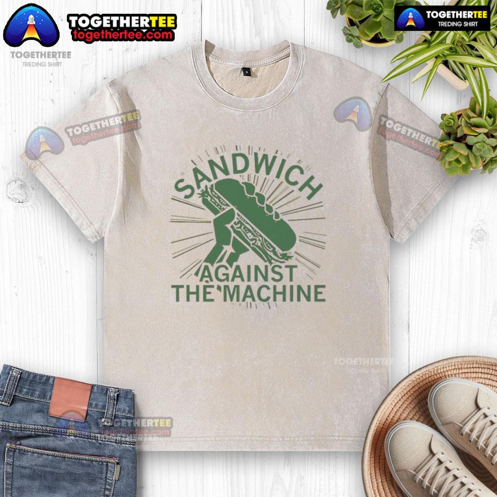 Premium sandwich against the machine washed t-shirt displayed on a wooden surface, showcasing its unique graphic design.