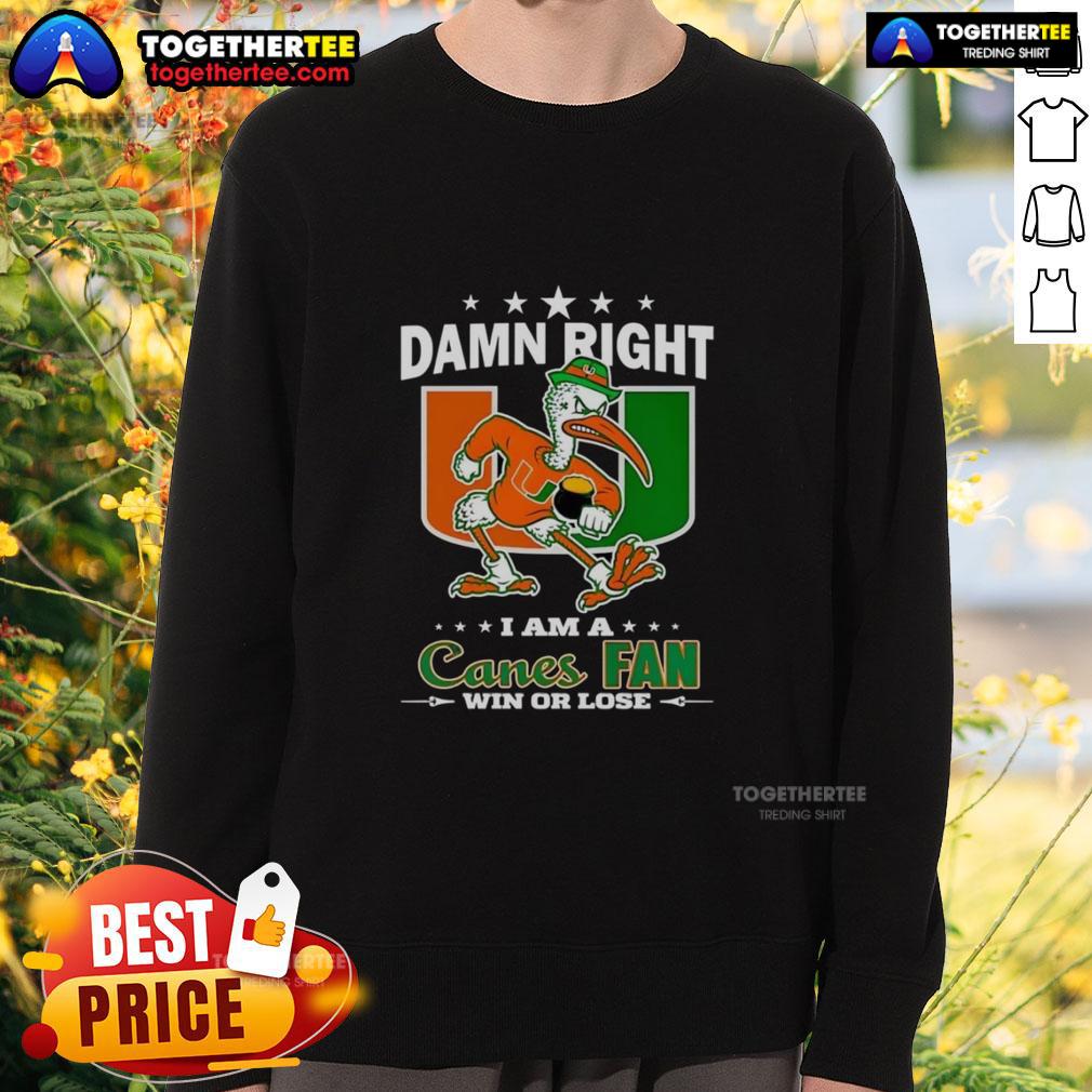 Alt Text: Miami Hurricanes mascot sweatshirt showcasing 'Damn Right I Am A Canes Fan Win Or Lose' slogan for fans.