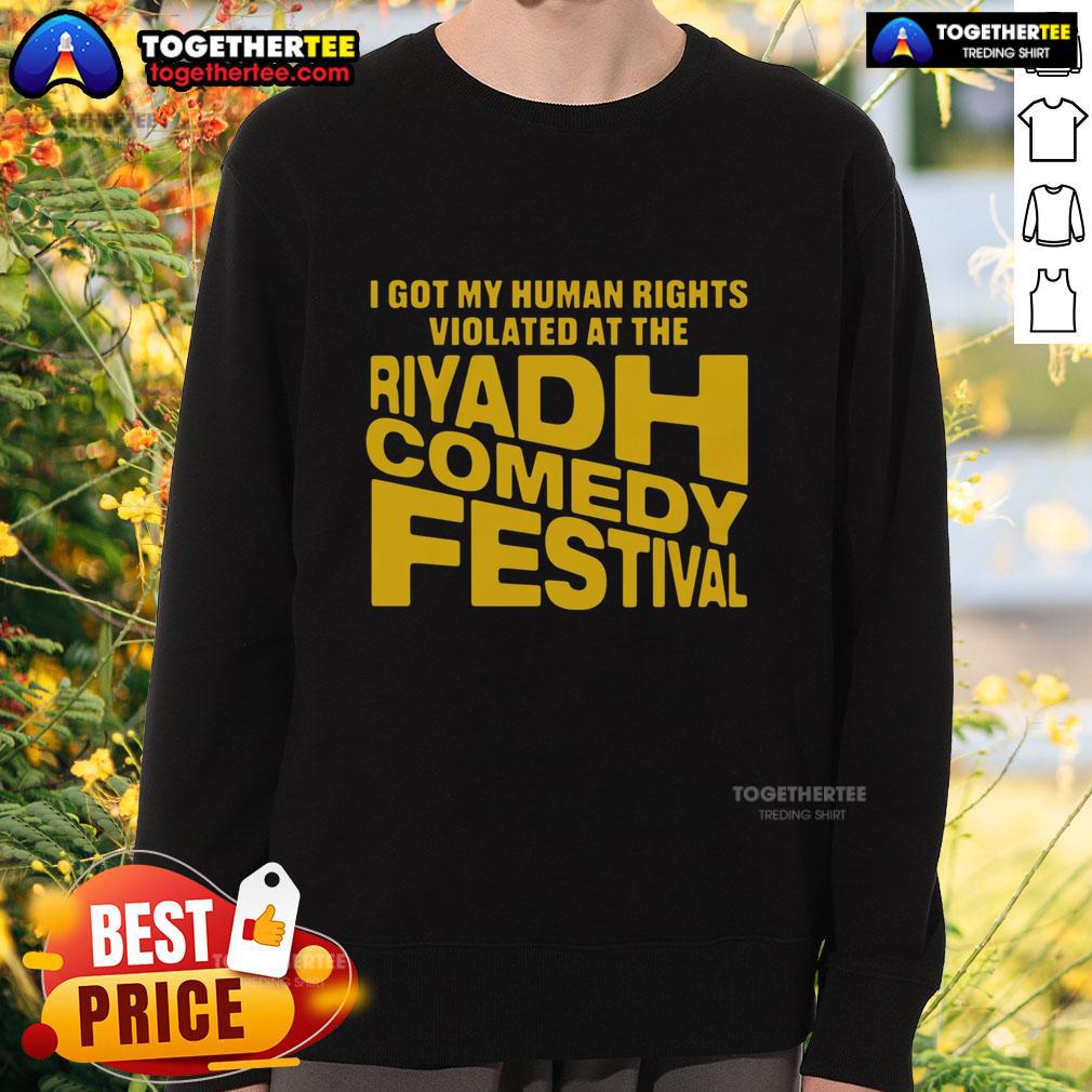 Good I Got My Human Rights Violated sweatshirt at the Riyadh Comedy Festival, showcasing bold humor and cultural commentary.