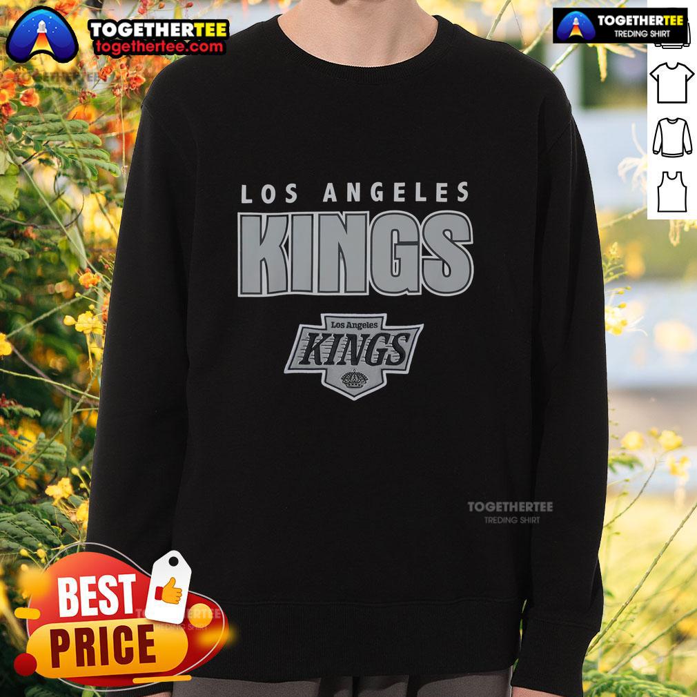 Alt Text: Hot Los Angeles Kings throwback sweatshirt featuring vintage logo and stylish design for fans of the NHL team.