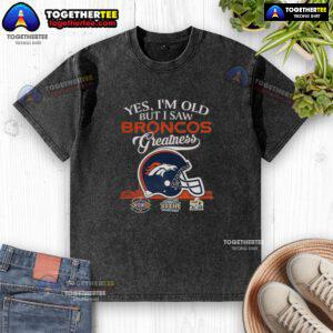 Vintage washed t-shirt featuring Denver Broncos Super Bowl helmet and skyline, perfect for fans celebrating team greatness.