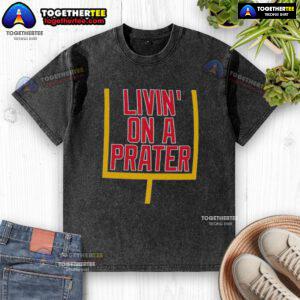 Alt Text: Nice Livin' On A Prater Buffalo Bills washed t-shirt featuring a vintage design and team logo for fans.
