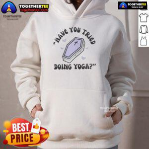 Alt Text: Cozy 'Have You Tried Doing Yoga' hoodie displayed on a rustic background, perfect for yoga enthusiasts.