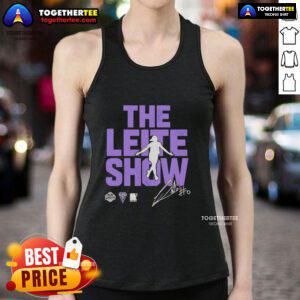 Carla Leite wearing the Original The Leite Show Golden State Valkyries tank top, showcasing vibrant design and style.