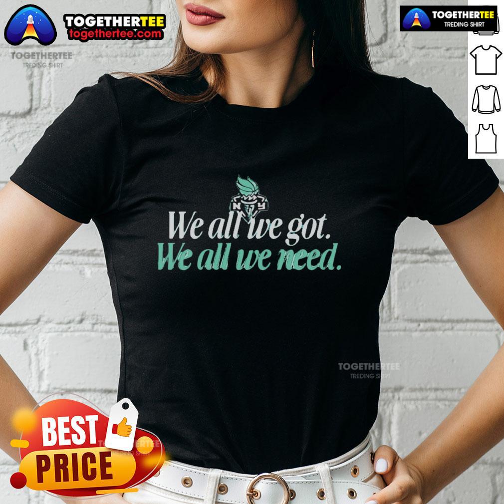 Alt Text: Original We All We Got We All We Need New York Liberty Ladies Tee featuring team colors and logo design.