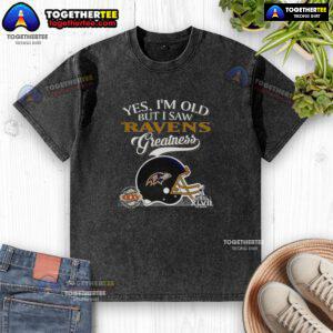 Vintage Baltimore Ravens Super Bowl helmet graphic on a washed t-shirt with skyline design, celebrating team greatness.
