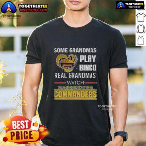 Grandma wearing 'Real Grandmas Watch Washington Commanders Football' T-shirt, enjoying bingo night with friends.