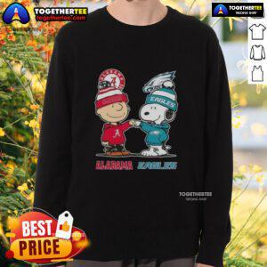 Alt Text: Cute Charlie Brown and Snoopy sweatshirt featuring Alabama Crimson Tide and Philadelphia Eagles logos.