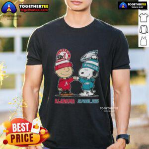 Alt Text: Cute Charlie Brown and Snoopy T-shirt featuring Alabama Crimson Tide and Philadelphia Eagles designs.