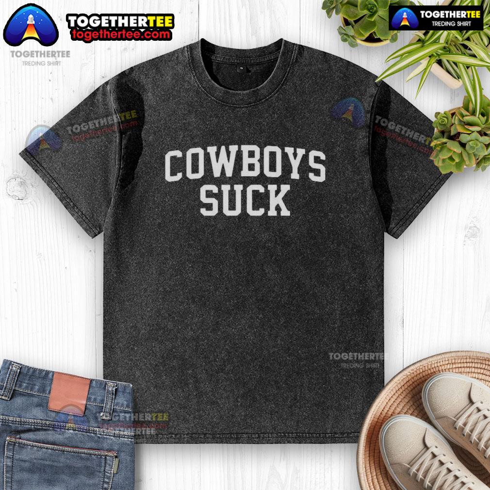 Fan wearing 'Cowboys Suck' washed t-shirt at Good Chiefs vs Lions game, showcasing team spirit and rivalry.