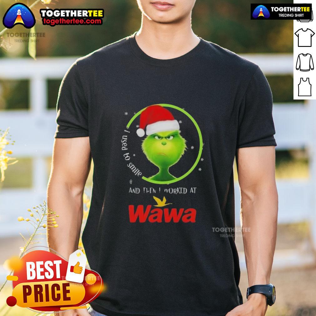 Good Grinch Christmas t-shirt featuring 'I Used To Smile And Then I Worked At Wawa' in festive design.