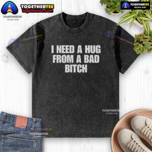 Good I Need A Hug From A Bad Bitch washed t-shirt featuring bold graphic print on soft fabric.