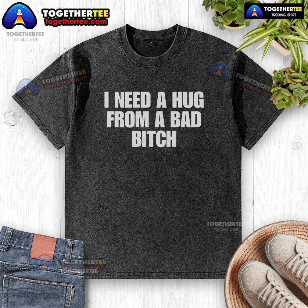Good I Need A Hug From A Bad Bitch washed t-shirt featuring bold graphic print on soft fabric.