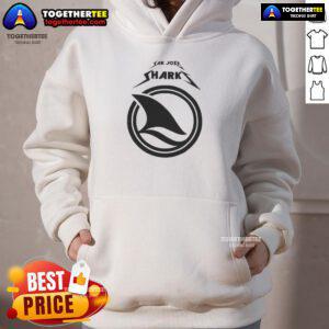 Fan wearing a cozy hoodie at a San Jose Sharks game day, showcasing team spirit and excitement for the match.