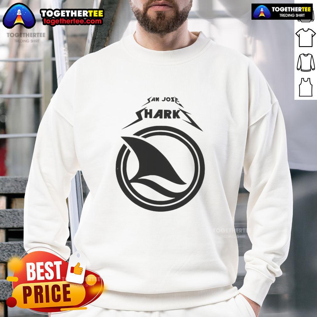 Fan wearing a cozy sweatshirt at a San Jose Sharks game day, showcasing team spirit and excitement for the match.