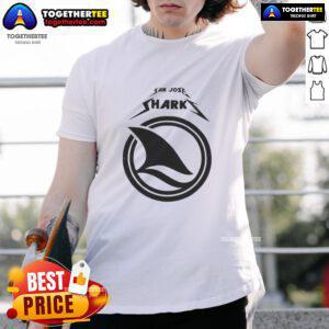 Enthusiastic fan wearing a favorite t-shirt at a San Jose Sharks game day, showcasing team spirit and excitement.