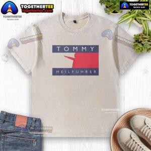 Good Tommy Heilfuhrer logo parody on a washed t-shirt, featuring a unique and humorous design for casual wear.