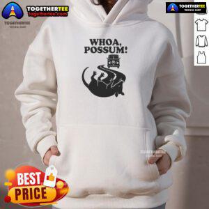 Cozy Good Whoa Possum Hoodie displayed on a hanger, featuring a playful possum graphic and vibrant colors.
