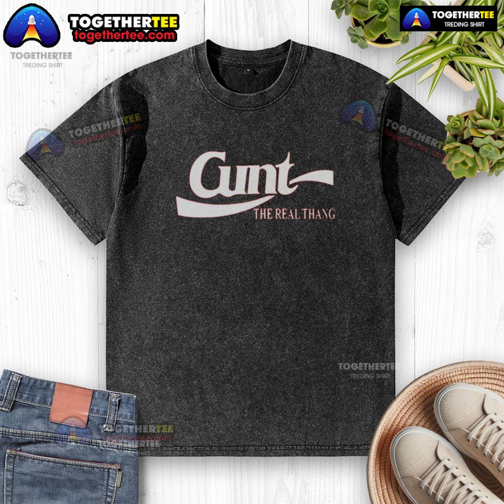 Nice Cunt The Real Thang logo on a washed t-shirt, showcasing stylish graphic design and casual fashion.