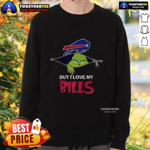 Alt Text: Cheerful person wearing a I Hate People But I Love My Buffalo Bills Grinch sweatshirt for Christmas festivities.
