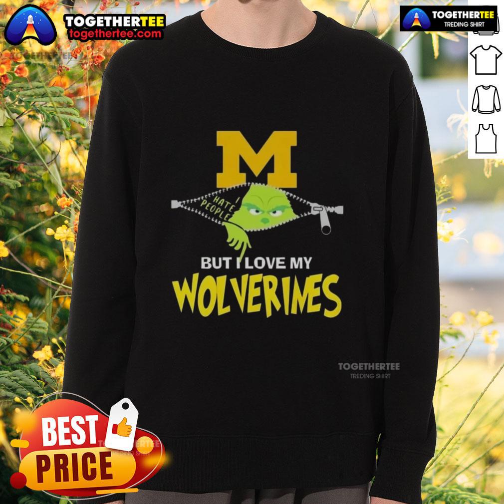 Original Grinch Christmas sweatshirt featuring Michigan Wolverines logo, perfect for holiday sports fans.