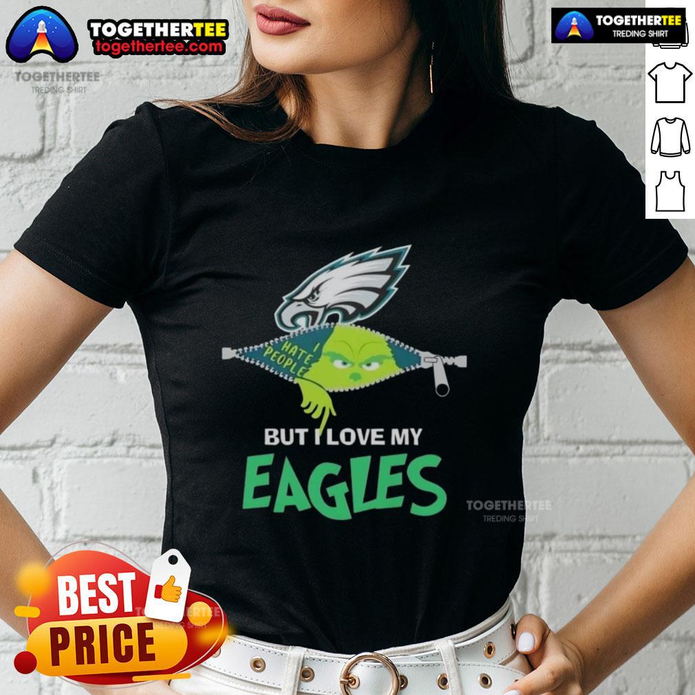 Original Grinch Christmas tee for ladies featuring Philadelphia Eagles design, perfect for holiday cheer and team spirit.