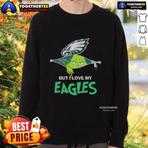 Alt Text: Cozy Original Grinch Christmas sweatshirt featuring love for Philadelphia Eagles in festive colors and design.