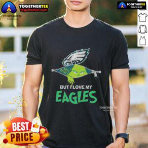 Original Grinch Christmas t-shirt featuring 'But I Love My Philadelphia Eagles' slogan, perfect for holiday fans.