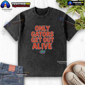 Pretty Florida Gators football washed t-shirt featuring 'Only Gators Get Out Alive' slogan for fans and alumni.