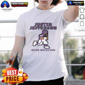 Top Justin Jefferson Minnesota Vikings wide receiver pixel T-shirt featuring vibrant graphics and team colors.