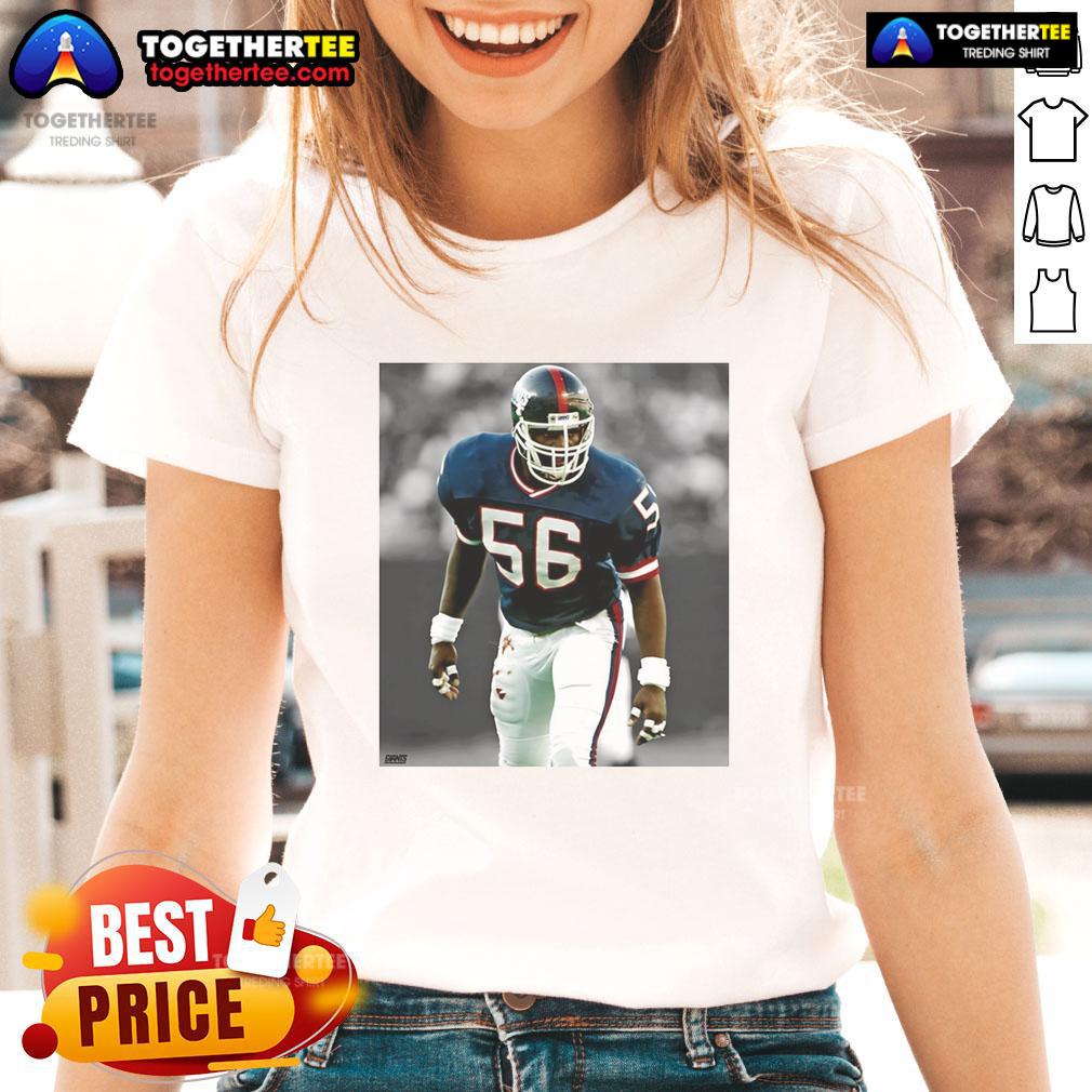 Top Lawrence Taylor New York Giants football ladies tee featuring team colors and iconic player graphic.