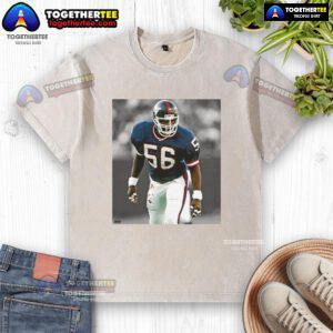 Alt Text: Top Lawrence Taylor New York Giants football washed t-shirt, showcasing vintage design and team spirit.