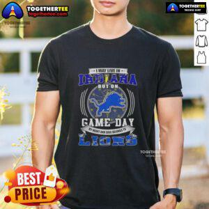 Top I May Live In Indiana But On Game Day Detroit Lions Football T-Shirt featuring vibrant team graphics and comfy fit.