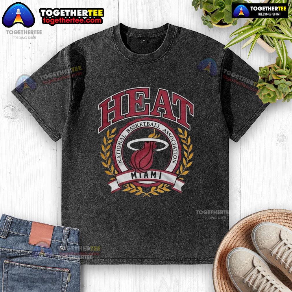 Retro washed t-shirt featuring the Miami Heat NBA logo framed by a laurel wreath, perfect for basketball fans.